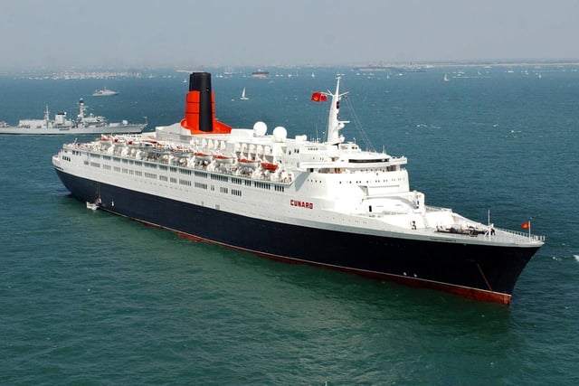 The QE2 in the Solent Tuesday June 28, 2005, where vessels from a massive gathering of the world's navies have anchored at Spithead off Portsmouth, for the International Fleet Review which will be carried out by Queen Elizabeth II from HMS Endurance. As well as warships, the gathered vessels include tall ships, lifeboats, cruise liners and representatives from all sectors of the maritime industry. See PA story SEA Trafalgar. PRESS ASSOCIATION Photo. Photo credit should read: Chris Young / PA.