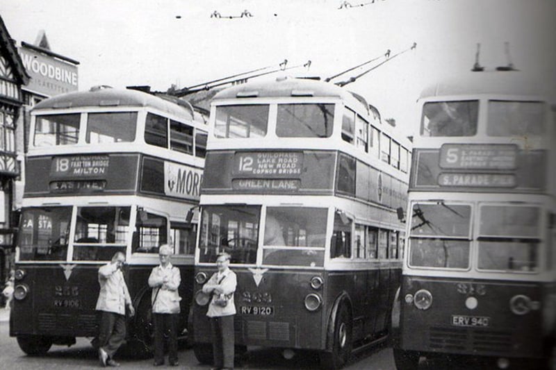Three members of the Corporation bus company 'The City of Portsmouth Passenger Transport Department' have a break before setting off from the Hard to Eastney in 1961.