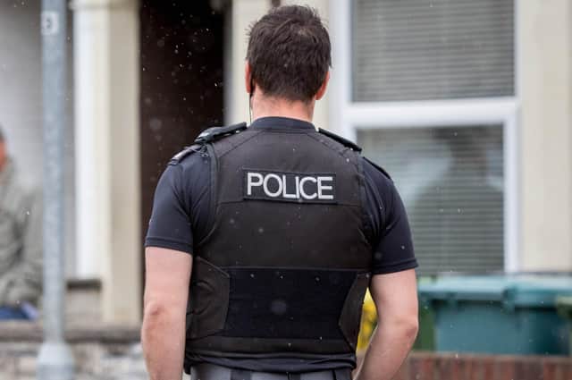 Library image of a police officer speaking to residents in Portsmouth,

Picture: Habibur Rahman
