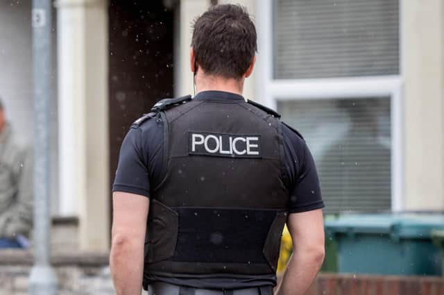 Library image of a police officer speaking to residents in Portsmouth,
Picture: Habibur Rahman