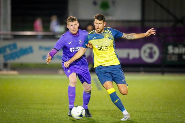 Former Stoneham striker Callum Laycock, right, in action for Moneyfields last night. Picture by Dave Bodymore.