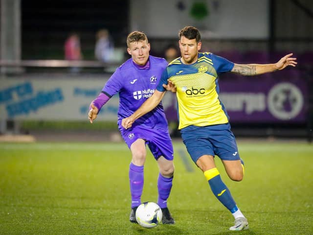 Former Stoneham striker Callum Laycock, right, in action for Moneyfields last night. Picture by Dave Bodymore.