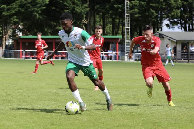 Horndean's Tommy Tierney, right, gives chase against Bognor. Picture by Martin Denyer