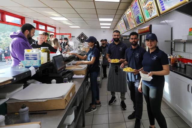 Staff at Binley Mega Chippy in Coventry Picture: SWNS