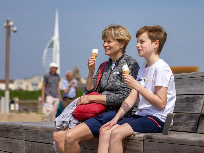 Portsmouth was greeted with glorious hot weather this weekend. Pictured are enjoying the traditional summer diet in Old Portsmouth. Picture: Mike Cooter (110524)