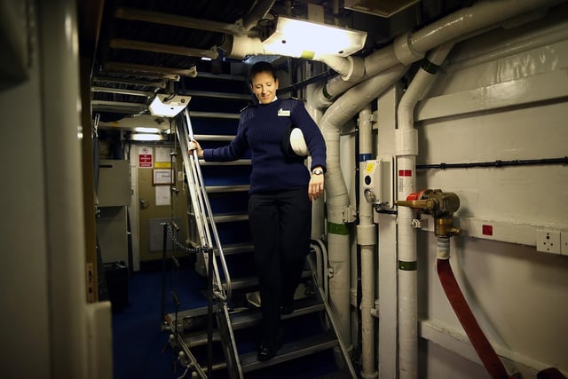 A crew member seen walking down a stairwell on HMS Illustrious May 10, 2013 Photo by Dan Kitwood/Getty Images