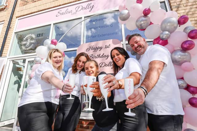 Salon Dolly in Havant celebrates it's first birthday. Owner Mollie Warton (2nd right) with Chloe Webb, Laci Anderson, Lis, Anderson and Nathan Close. Picture: Paul Collins
