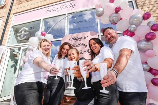 Salon Dolly in Havant celebrates it's first birthday. Owner Mollie Warton (2nd right) with Chloe Webb, Laci Anderson, Lis, Anderson and Nathan Close. Picture: Paul Collins