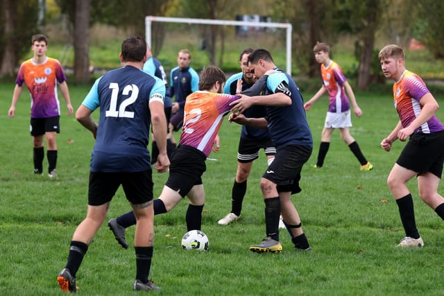 Fundraising (blue) v King George Rovers. Picture: Sam Stephenson.