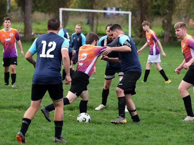 Fundraising (blue) v King George Rovers. Picture: Sam Stephenson.