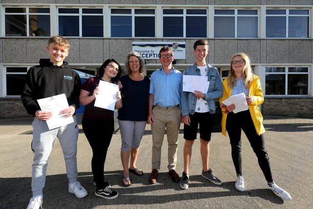 Brune Park Community School headteacher, Kirstie Andrew-Power, alongside GFM chief executive, Ian Potter, and pupils who had just received their GCSE results.
Picture: Chris Moorhouse