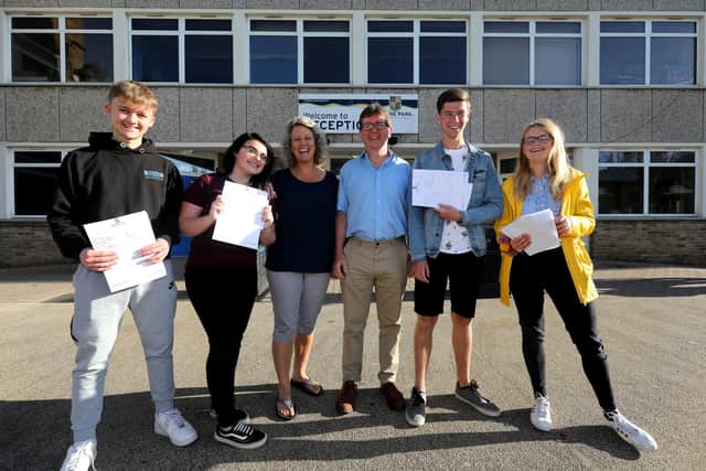 Brune Park Community School headteacher, Kirstie Andrew-Power, alongside GFM chief executive, Ian Potter,  and pupils who had just received their GCSE results.
 
Picture: Chris Moorhouse