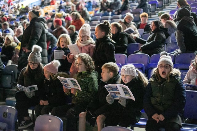 Meon Junior School singing at the event