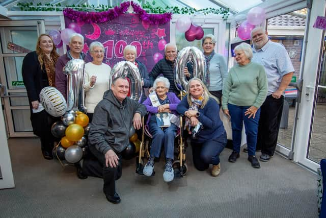 Barbara McMahon with her family and nursing staff at Russell Churcher Court, Gosport
Picture: Habibur Rahman