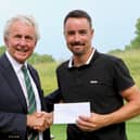 Darren Walkley runner-up in the 108th Hampshire, Isle of Wight and Channel Islands Amateur Championship, with club president Bob Stillwell at Hockley Golf Club. Picture by Andrew Griffin.