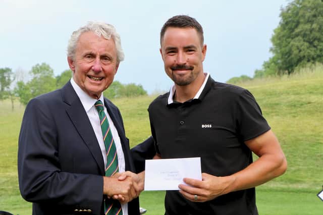 Darren Walkley runner-up in the 108th Hampshire, Isle of Wight and Channel Islands Amateur Championship, with club president Bob Stillwell at Hockley Golf Club. Picture by Andrew Griffin.