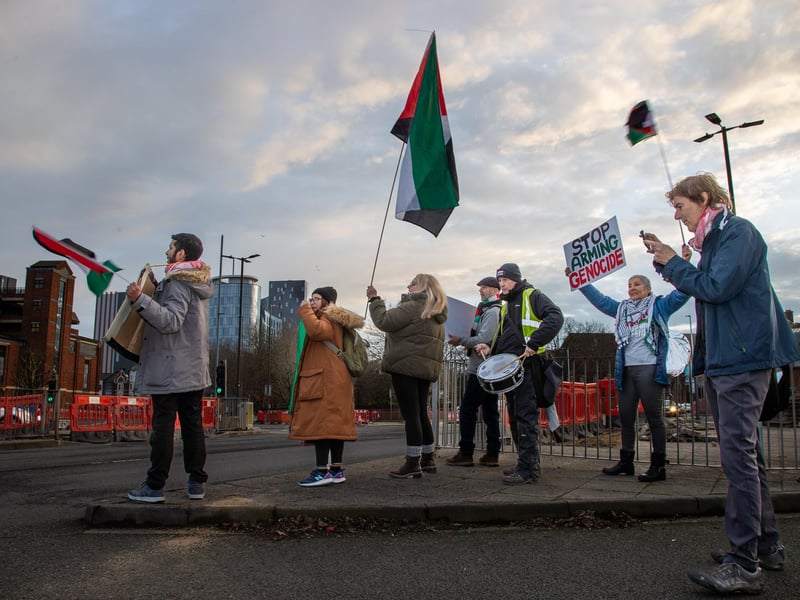 Demonstrators outside Unicorn Gate make their views known
Photos by Alex Shute
