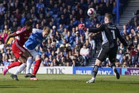 Joe Pigott heads home Michael Jacobs' cross to secure a 1-0 win over Accrington at Fratton Park. Picture: Jason Brown/ProSportsImages