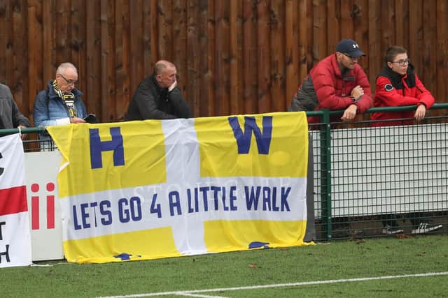 Some of the Hawks fans that made up a record 2,048 crowd at Dorking's Meadowbank Stadium on Boxing Day. Picture: Dave Haines