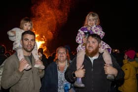 People from across the region descended onto the grounds of HMS Sultan on Thursday evening for a night of excitement, bonfire and fireworks.

Pictured - Nathan Fall and Elsie, 20 months and The Sims Family with daughter Amelia, 3

Photos by Alex Shute