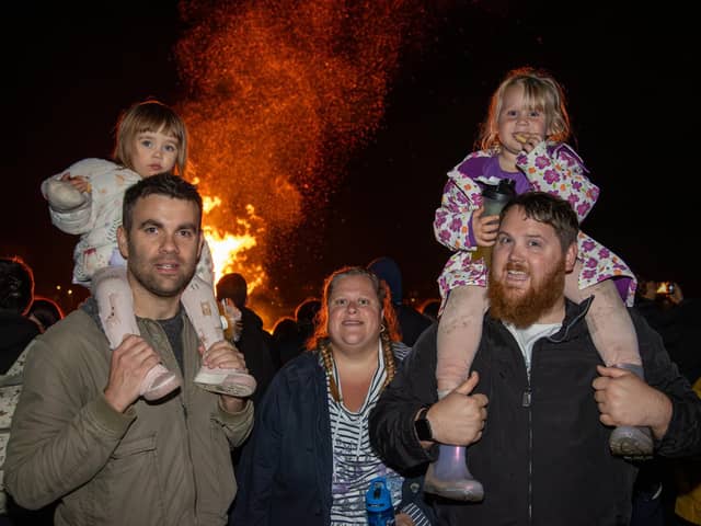 People from across the region descended onto the grounds of HMS Sultan on Thursday evening for a night of excitement, bonfire and fireworks.

Pictured - Nathan Fall and Elsie, 20 months and The Sims Family with daughter Amelia, 3

Photos by Alex Shute