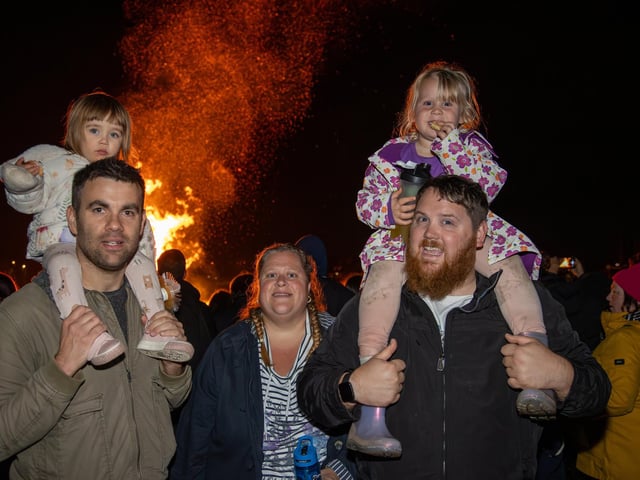 People from across the region descended onto the grounds of HMS Sultan on Thursday evening for a night of excitement, bonfire and fireworks.Pictured - Nathan Fall and Elsie, 20 months and The Sims Family with daughter Amelia, 3Photos by Alex Shute