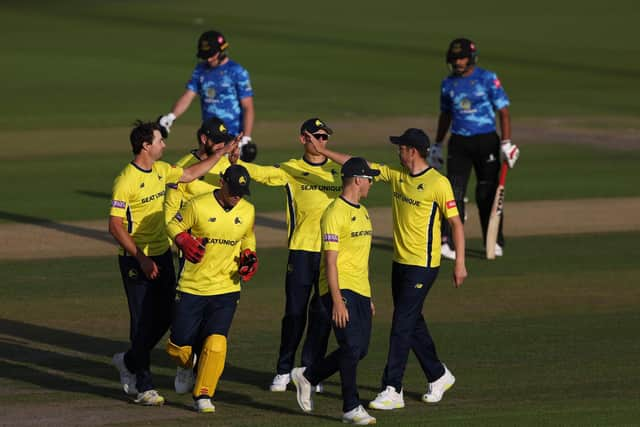 Hampshire's James Fuller is congratulated after dismissing Sussex skipper Ravi Bopara. Photo by Warren Little/Getty Images