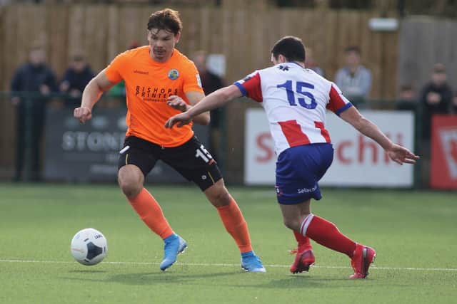 Craig Robson in possession at Dorking. Picture: Kieron Louloudis