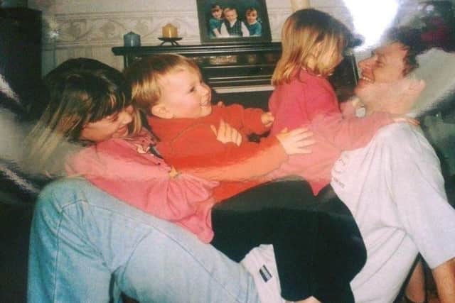 Alan Neilson with his three children.