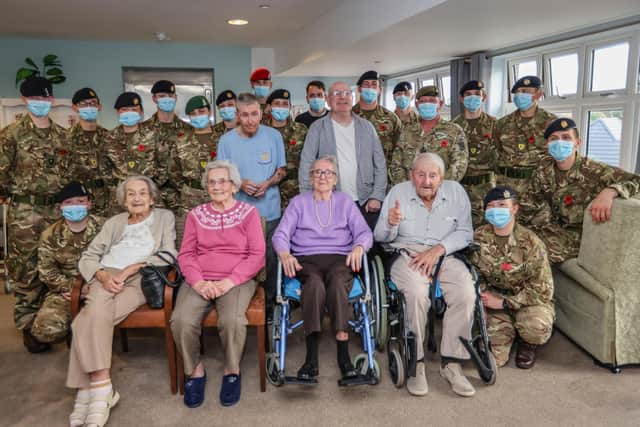 20 soldiers from Fox Platoon at Army Training Regiment Winchester came in to visit the residents of Encore's Hamble Heights Care Home and chat to them ahead of Remembrance Day:Care home residents at Hamble Heights welcomed army recruits