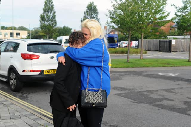 Kirsty Glancy, 31, with her son Marley, 11, from Havant. Kirsty believes that children returning to school need to 'get back into a routine'.

Picture: Sarah Standing