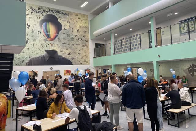 Students file into Castle View Academy to find out their grades on results day 2022.