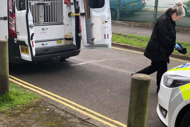 Police seized evidence at the scene. Picture: David George