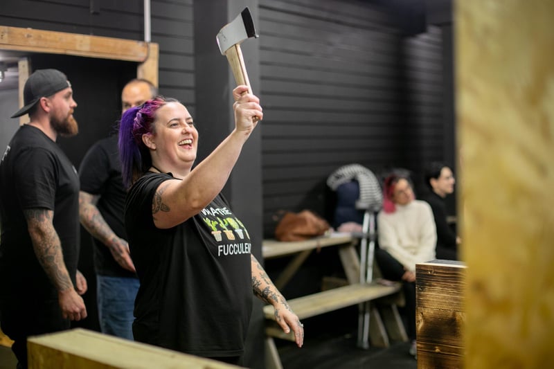 Pictured: Mardie Hood having a go at throwing an axe.

Picture: Habibur Rahman