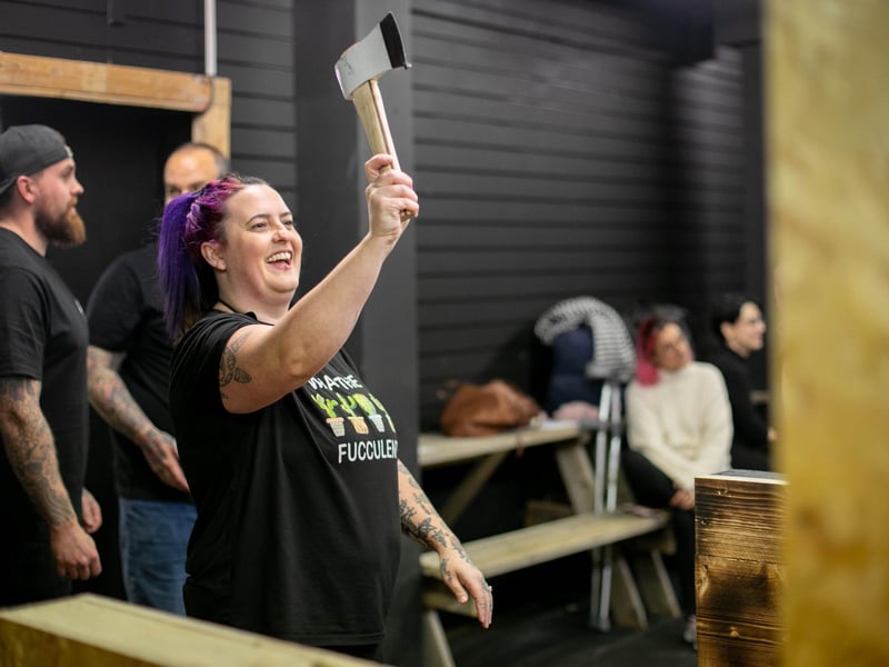 Pictured: Mardie Hood having a go at throwing an axe.
Picture: Habibur Rahman