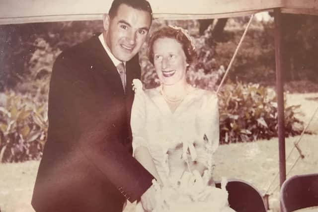 Carrie Pollock, 99, Hayling Island, recovered from Covid-19 after care at QA hospital.
Pictured is: Copy picture of Carrie Pollock cutting her wedding cake with husband, William Pollock, in Nairobi, 1956.