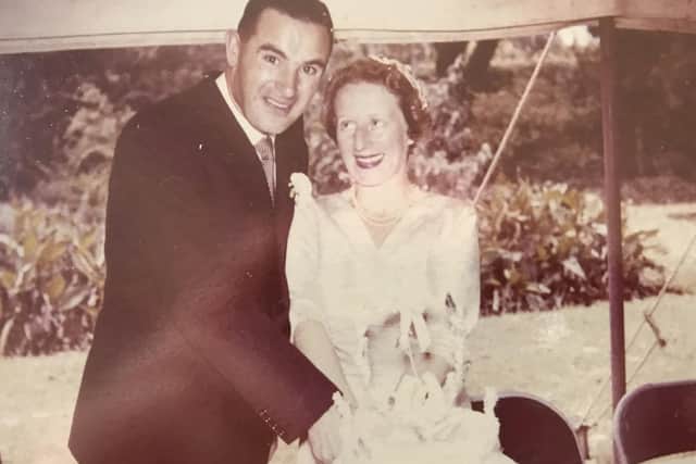 Carrie Pollock, 99, Hayling Island, recovered from Covid-19 after care at QA hospital.

Pictured is: Copy picture of Carrie Pollock cutting her wedding cake with husband, William Pollock, in Nairobi, 1956. 