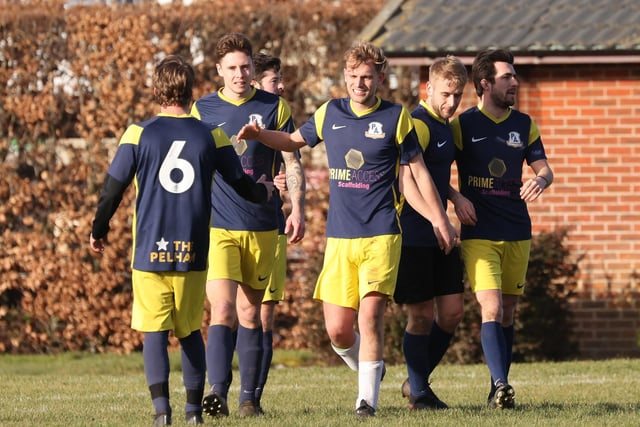 Pelham celebrate a goal in their 2-2 draw with AFC Farlington. Picture by Kevin Shipp