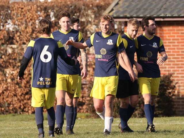 Pelham celebrate a goal in their 2-2 draw with AFC Farlington. Picture by Kevin Shipp