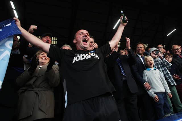 Paul Cook celebrates Pompey's League Two title triumph in 2017. Picture: Joe Pepler