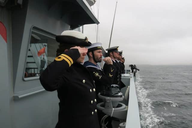 HMS Forth salutes the wrecks of HMS Ardent and Antelope