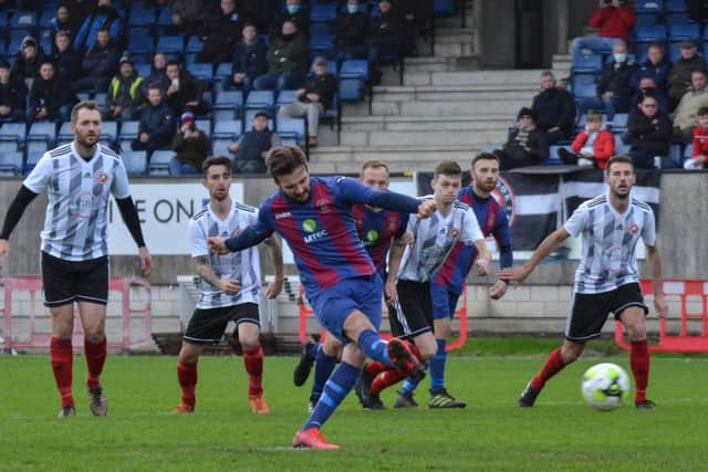 Dec Seiden converts a first minute penalty during US Portsmouth's 3-2 FA Vase third round win against Millbrook in December. They now host Christchurch in the last 32 on April 10. Picture: Daniel Haswell.