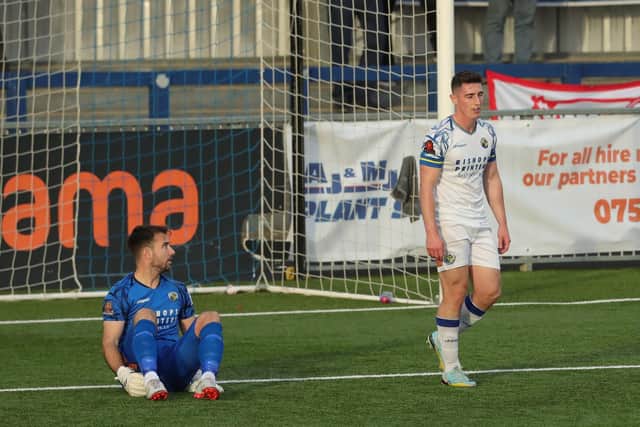 Goalkeeper Ross Worner and James Roberts react after Oxford's late winner. Picture by Dave Haines