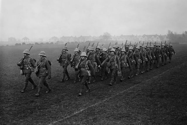 Members of the Royal Marines at marching drill on the parade ground at Eastney Barracks, Portsmouth, January 1927. They are about to embark for China.