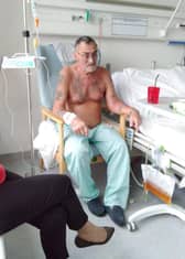 Mick Powell, 75, in hospital during the winter with what he believes was Covid-19.