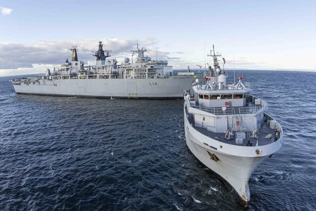 The officer is station on board HMS Albion, which is docked in Amsterdam. Pictured is The FS Garonne towing assault ship HMS Albion on November 4, 2021. Picture: Terence Wallet