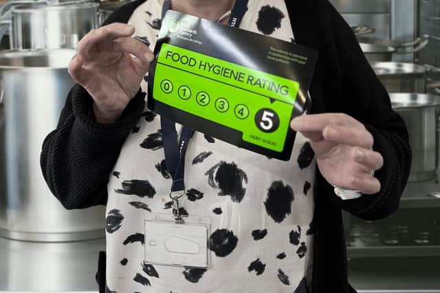 Sandra (Sandy) Ball, HTC Catering Manager with the team's reinstated 5/5 grading from the FSA.