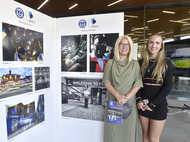 The 125 years celebrating Portsmouth FC in photographs exhibition is on show at Ravelin Sports Centre in Portsmouth and will be on display until Sunday, August 18, 2024.
Pictured is: Photographer Pete Blackman's wife Teressa Blackman and daughter Izzy Blackman (14) next to some of Pete's work.
Picture: Sarah Standing (050824-8995)