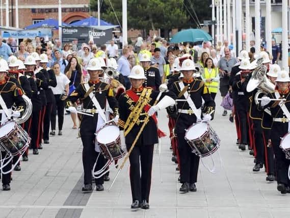 It's not the first time a Royal Marines band has put on a surprise performance - with an group from the band's School of Music surprising shoppers at Gunwharf Quays in 2018 . Picture: Malcolm Wells.