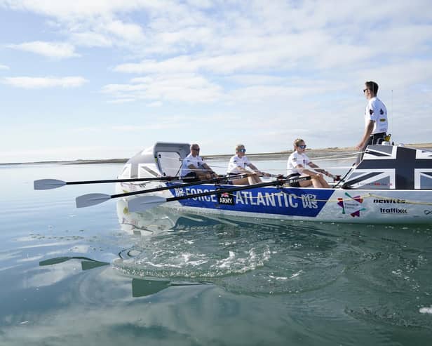 Instructors from the Royal Army Physical Training Corps, Captain Scott Pollock (standing), Staff Sergeant Phillip Welch (left), Warrant Officer Class 1 Victoria Blackburn (second left) and Sergeant Laura Barrigan, in training at Thorney Island near Chichester ahead of their attempt to row the Atlantic Ocean competing as the Force Atlantic 21 team in the Talisker Whisky Challenge. Picture date: Wednesday October 13, 2021.